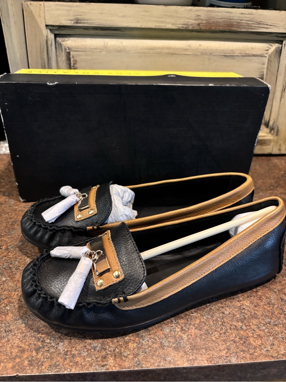 Very Volatile Black and Tan Tassel Moccasin Flats